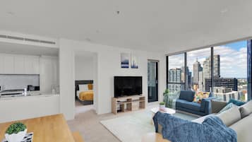 Deluxe Apartment, 3 Bedrooms, Balcony, City View | Living area