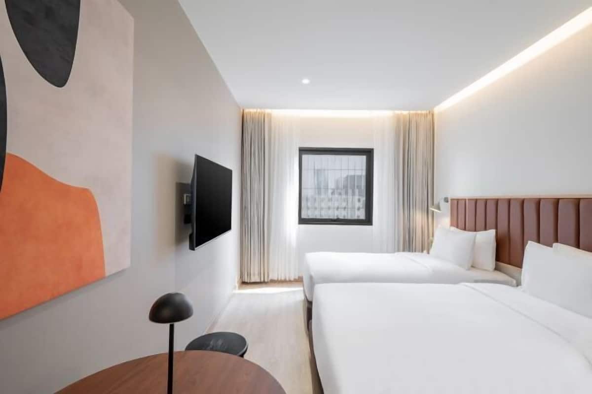 Desk, laptop workspace, free WiFi, bed sheets