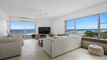 Deluxe Apartment, 2 Bedrooms, Balcony, Ocean View | Living room | 45-inch Smart TV with cable channels