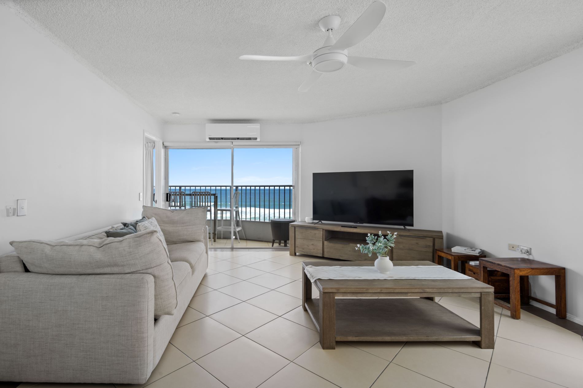 Deluxe Apartment, 2 Bedrooms, Balcony, Ocean View | Living room | 45-inch Smart TV with cable channels