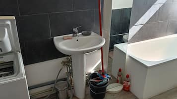 Shower, towels, toilet paper