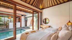 A bedroom with a large window, a pool, and a wooden ceiling. - Casa Bojo & Casa Bella Uluwatu (Pecatu)