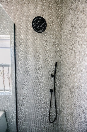 Shower, hair dryer, towels, soap
