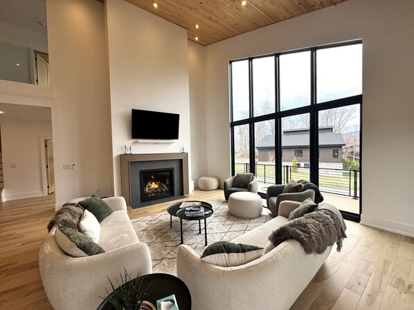 Smart TV, fireplace, foosball, books