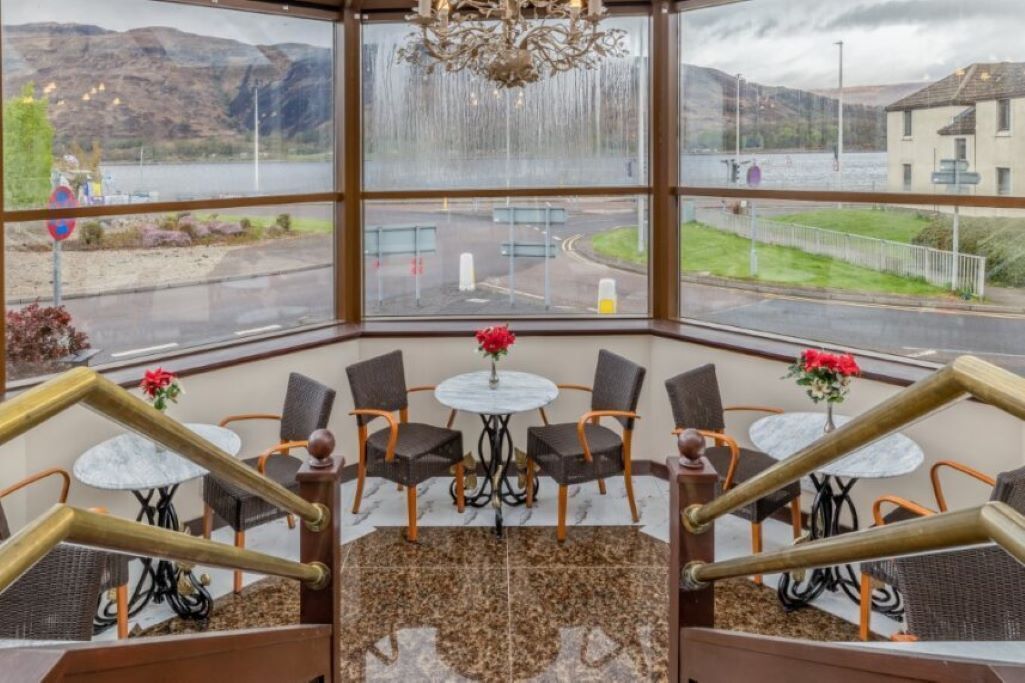 Savor morning coffee beside panoramic windows and scenic views.