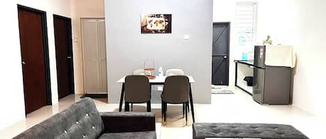 Villa | Living area | 32-inch flat-screen TV with cable channels