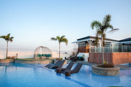 Outdoor pool. Sunday Belajandro Hotel