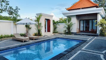 Outdoor pool, pool umbrellas, pool loungers