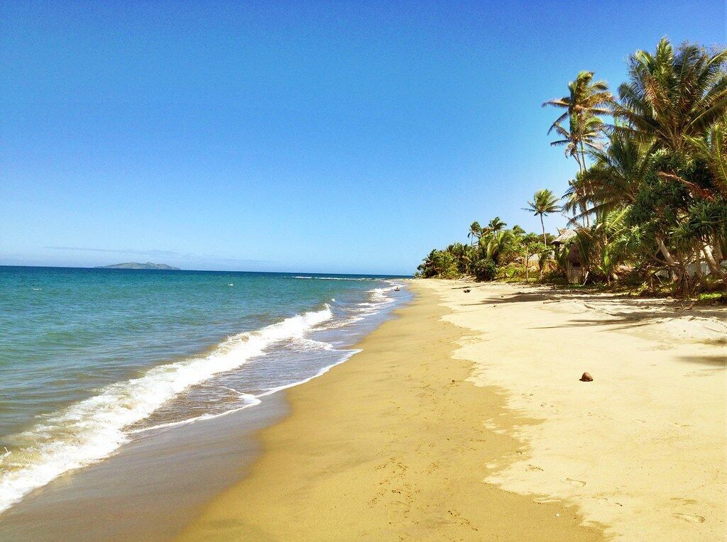 On the beach, sun loungers, beach towels