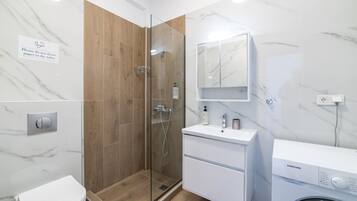 Dutxa, assecador de cabells i tovalloles