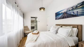 1 bedroom, desk, iron/ironing board, travel crib