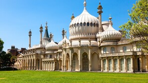 A large, ornate building with multiple domes and minarets, surrounded by a well-maintained lawn. - Apartment in Brighton near Brighton Beach (Brighton)