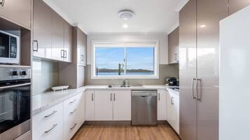 Coffee/tea maker, fridge, microwave, oven