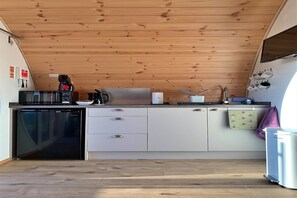 Fridge, microwave, stovetop, coffee/tea maker