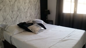 2 habitaciones, tabla de planchar con plancha y wifi gratis 