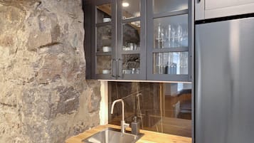 Espresso maker, electric kettle, dining tables