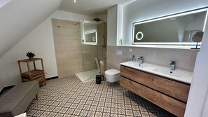 Shower, towels, toilet paper