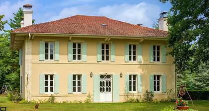 Family house in the forest and close to the ocean