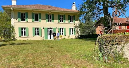 Family house in the forest and close to the ocean