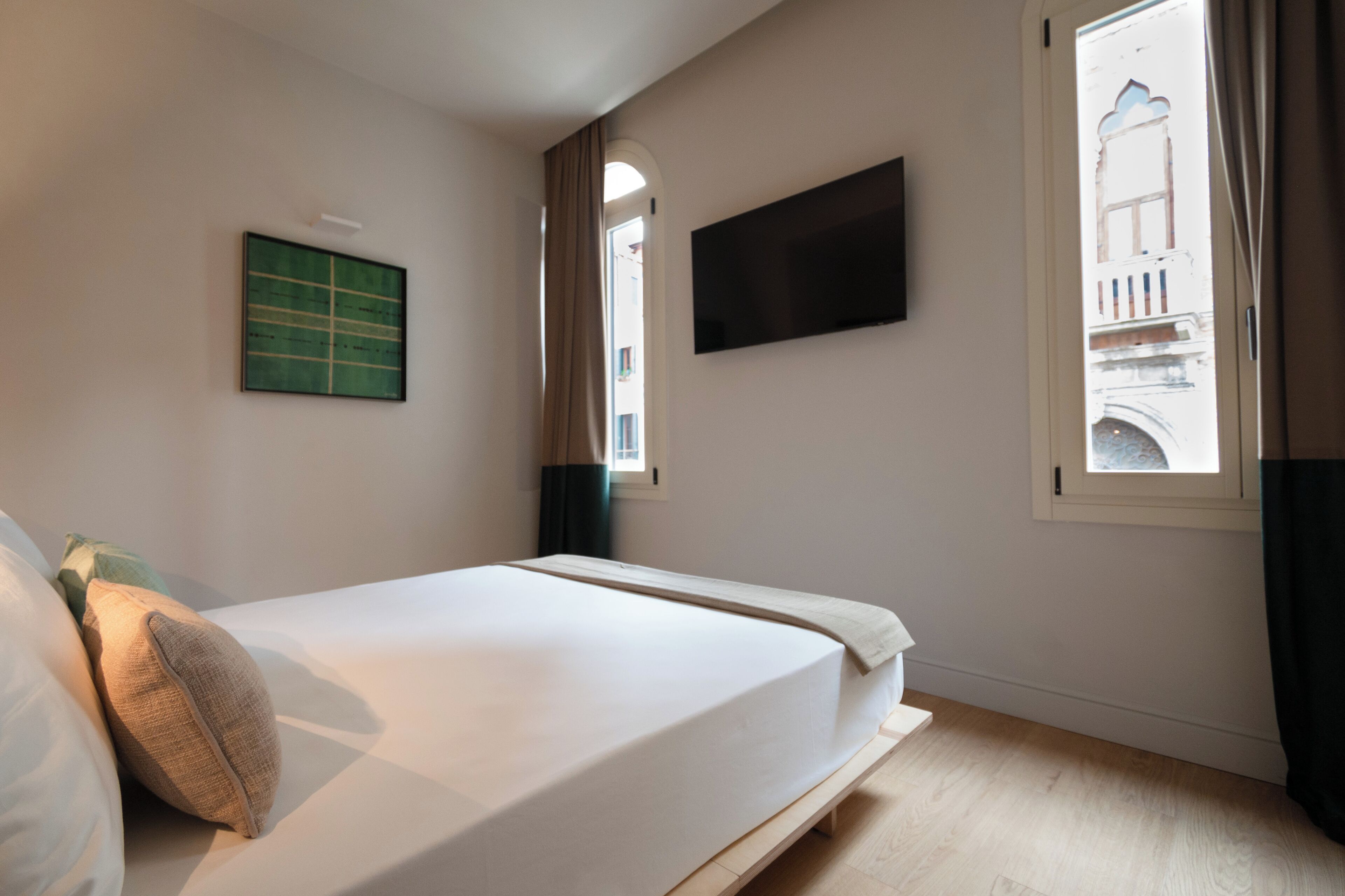 Premium bedding, down duvets, minibar, in-room safe