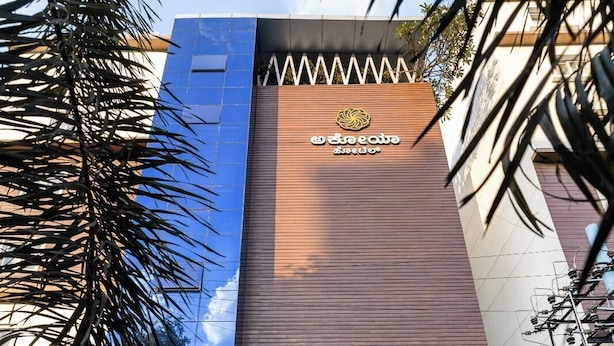 A modern building with a prominent logo and a large entrance. - Akoya Business Hotel - Smart Stays, Whitefield (Bengaluru)