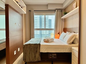 Desk, iron/ironing board, travel crib, WiFi (free)