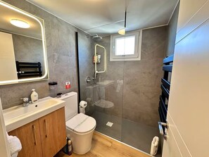 Hair dryer, towels, soap, shampoo