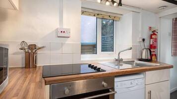 Cottage, Patio, Lake View | 4 bedrooms, iron/ironing board, free WiFi