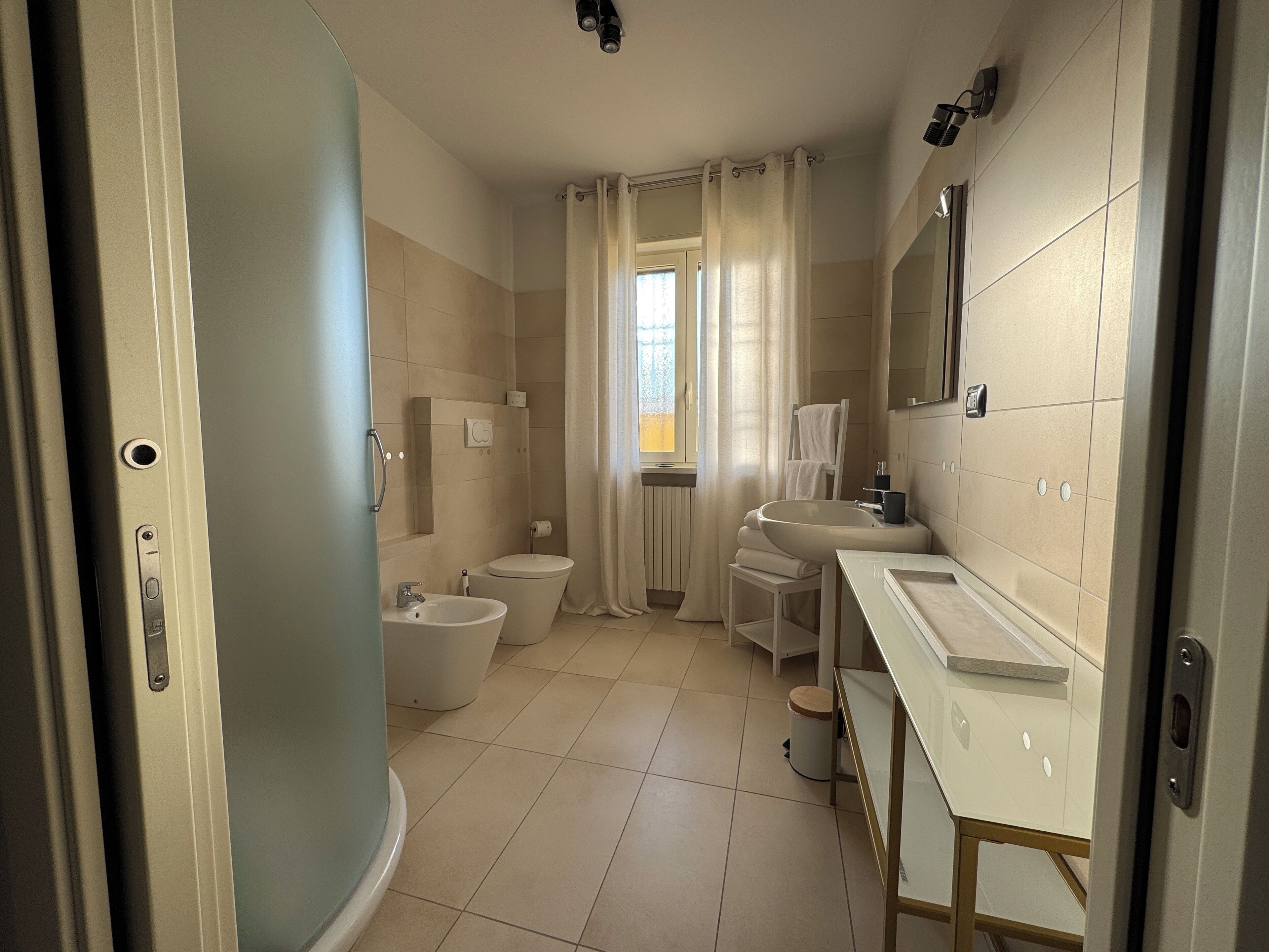 Shower, eco-friendly toiletries, hair dryer, bidet