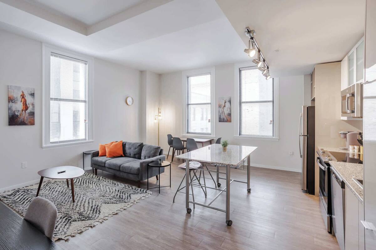 Deluxe Apartment, 3 Bedrooms | 2 Units | Living area | 52-inch Smart TV with digital channels, Netflix, Hulu