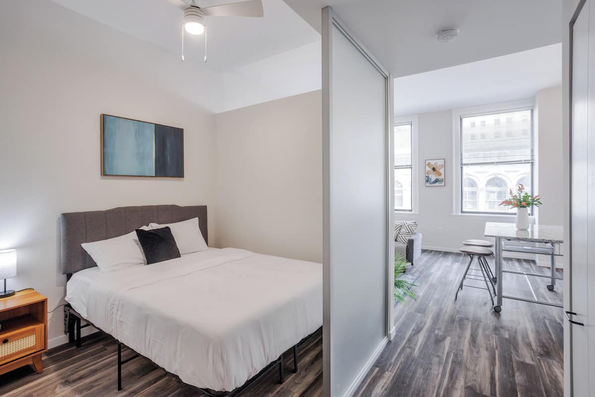 Deluxe Apartment, 1 Bedroom, Non Smoking | 2 bedrooms, desk, laptop workspace, iron/ironing board