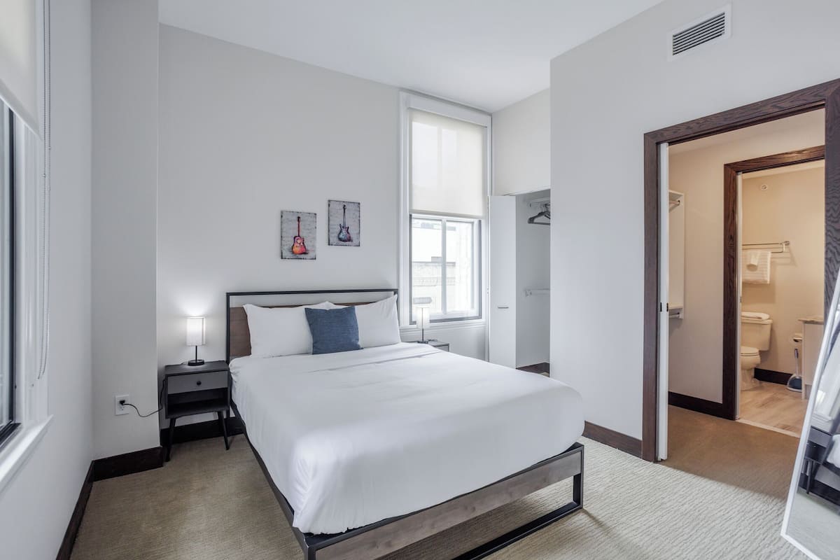 Deluxe Apartment, 1 Bedroom, Non Smoking | 2 bedrooms, desk, laptop workspace, iron/ironing board