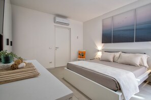 2 quartos, ferros/tábuas de passar roupa, Wi-Fi, roupa de cama