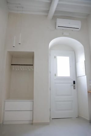 Family Quadruple Room, City View | 1 bedroom, in-room safe, laptop workspace, iron/ironing board