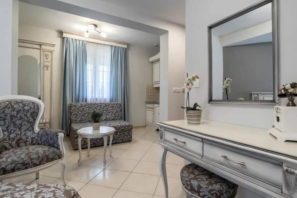 Deluxe Room, Balcony, City View | 2 bedrooms, desk, laptop workspace, bed sheets