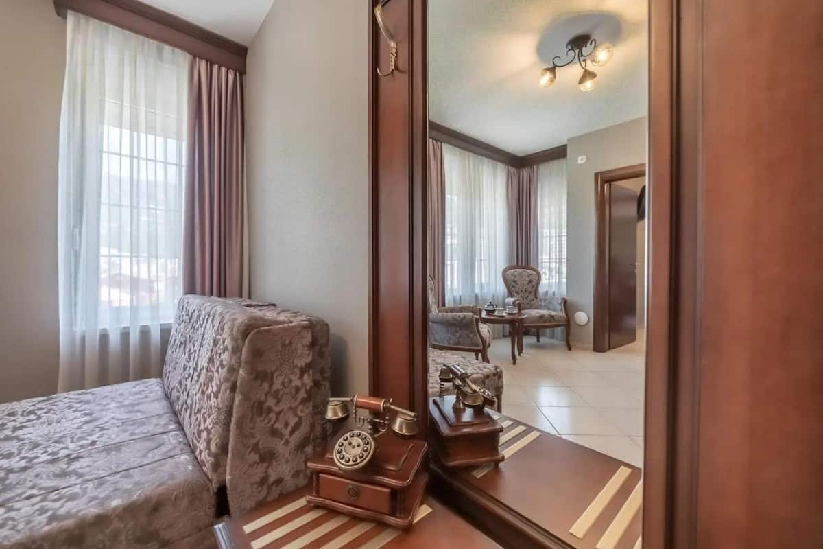 Junior Suite, Balcony | 2 bedrooms, desk, laptop workspace, bed sheets