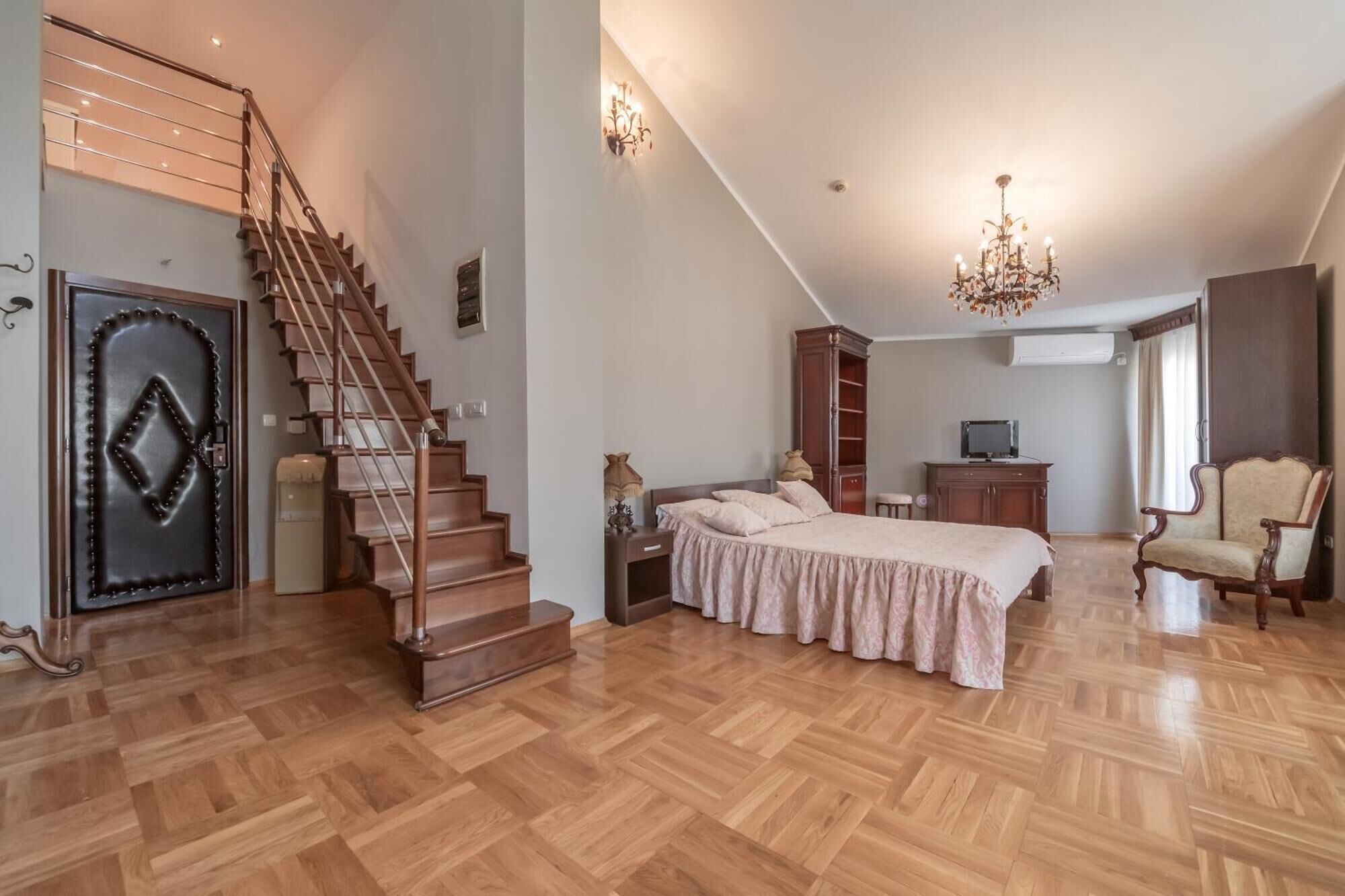 Deluxe Penthouse, Balcony, City View | Desk, laptop workspace, bed sheets