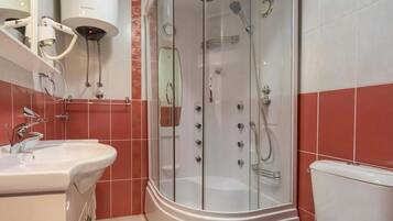 Shower, towels, soap, shampoo