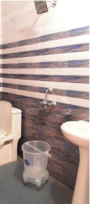 Shower, rainfall showerhead, designer toiletries, slippers