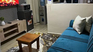 Chambre Ăconomique Double ou avec lits jumeaux, vue ville | Coin sĂ©jour