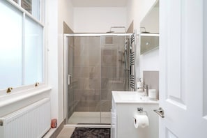 Hair dryer, towels, soap, shampoo