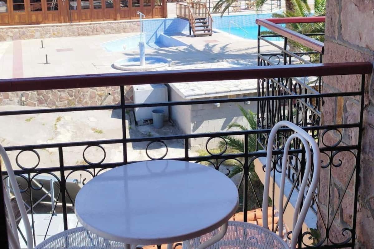Panoramic Studio, Pool View | Balcony view