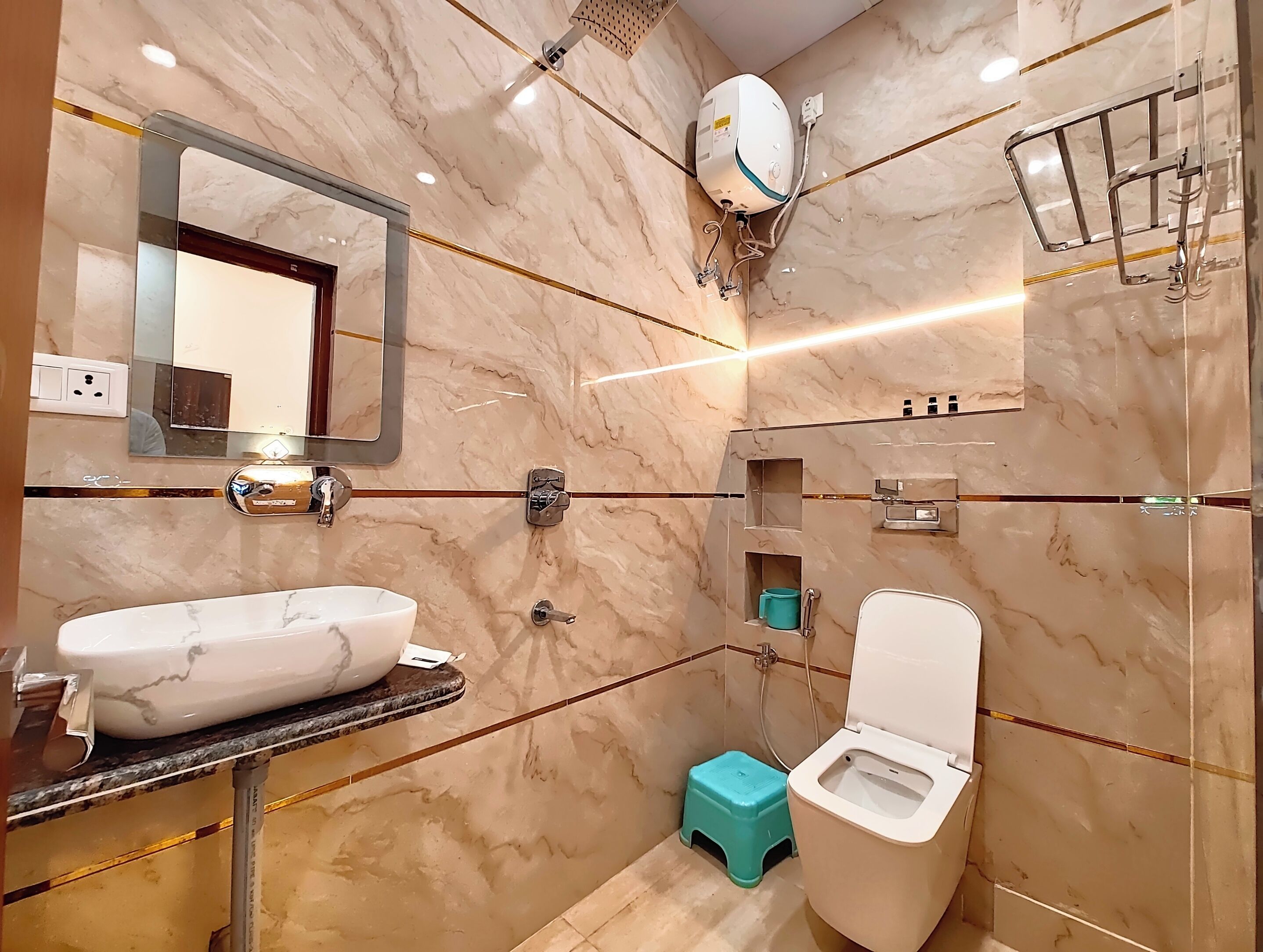 Shower, rainfall showerhead, designer toiletries, slippers