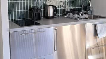 Apartamento conforto, vista para o jardim | Cozinha privada