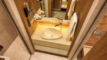 Hair dryer, slippers, towels, soap