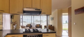 350 metre from beach. 2-bedroom, 2-bathroom ground floor apt with patio & braai