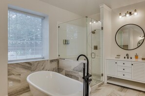 Shower, hair dryer, towels, shampoo