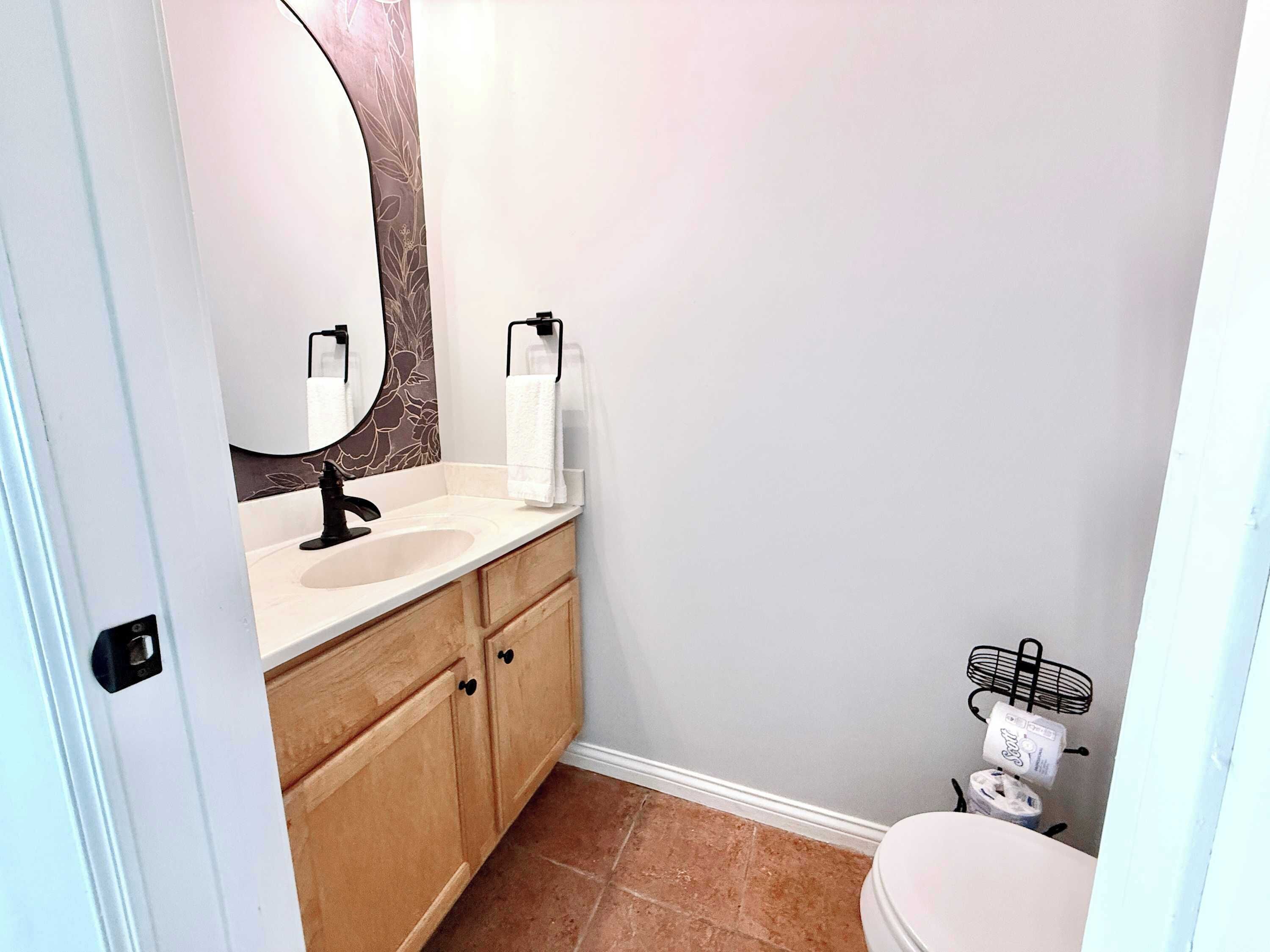 Shower, hair dryer, towels, shampoo