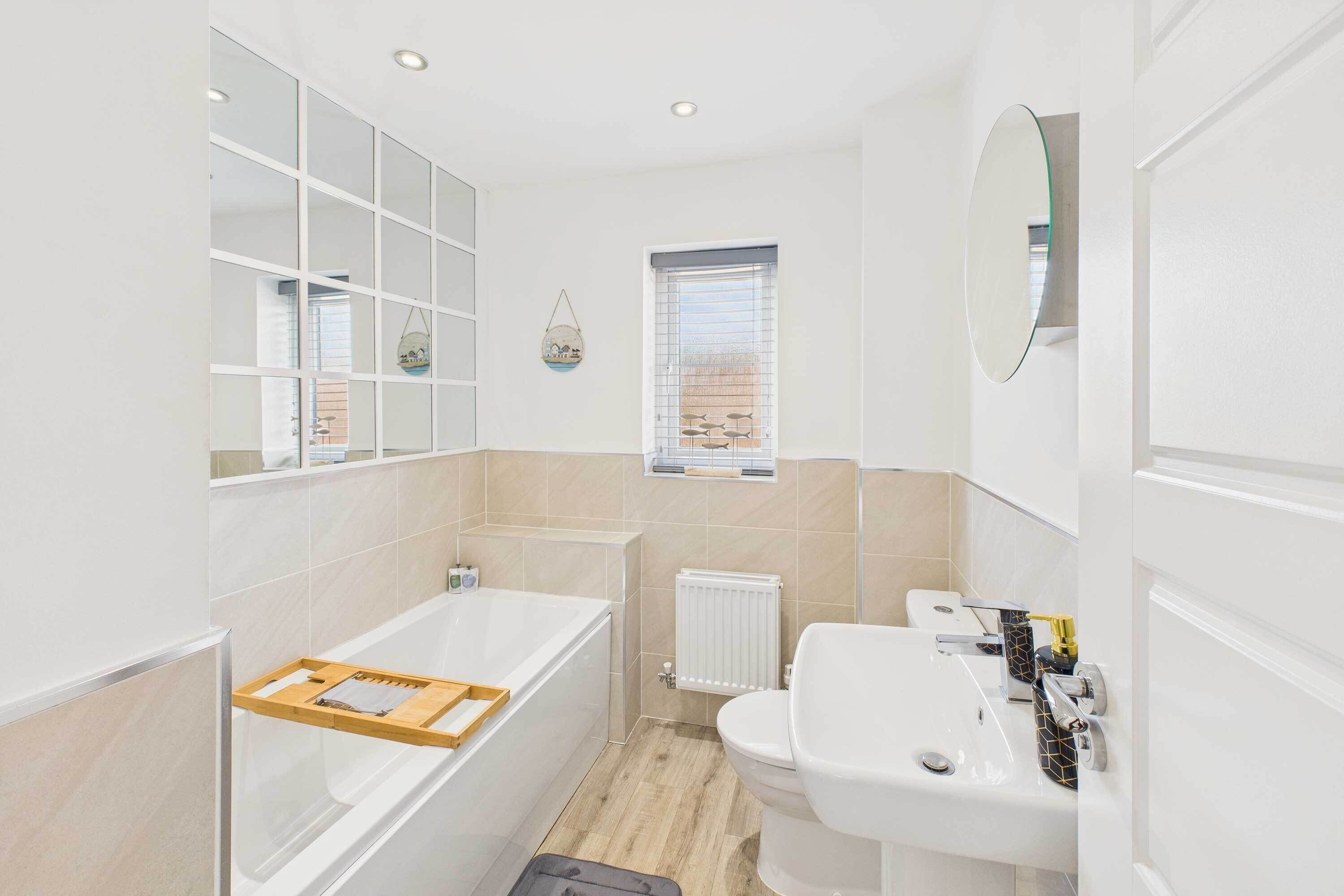 Shower, hair dryer, towels, shampoo