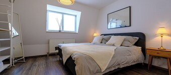 Vacation apartment with sunny balcony & parking space